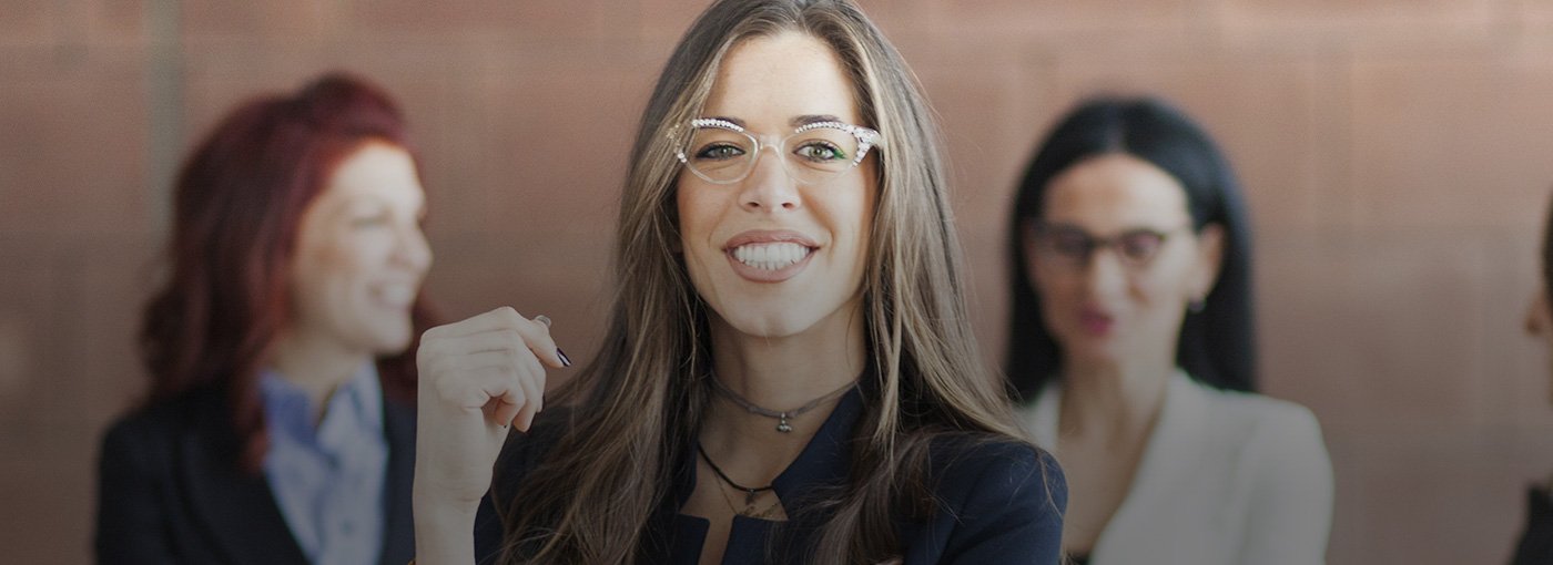 Smiling business woman wearing glasses
