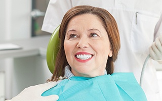 Smiling woman in dental chair