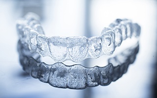 Clear Invisalign tray on tabletop
