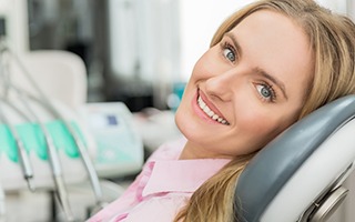 Smiling woman in dental chair